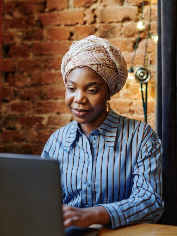Businesswoman working online on laptop