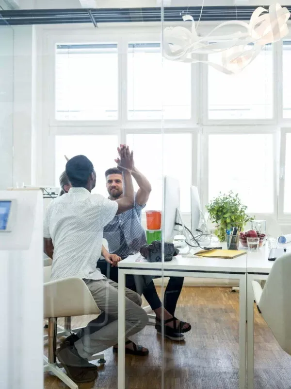 Graphic designers working over laptop